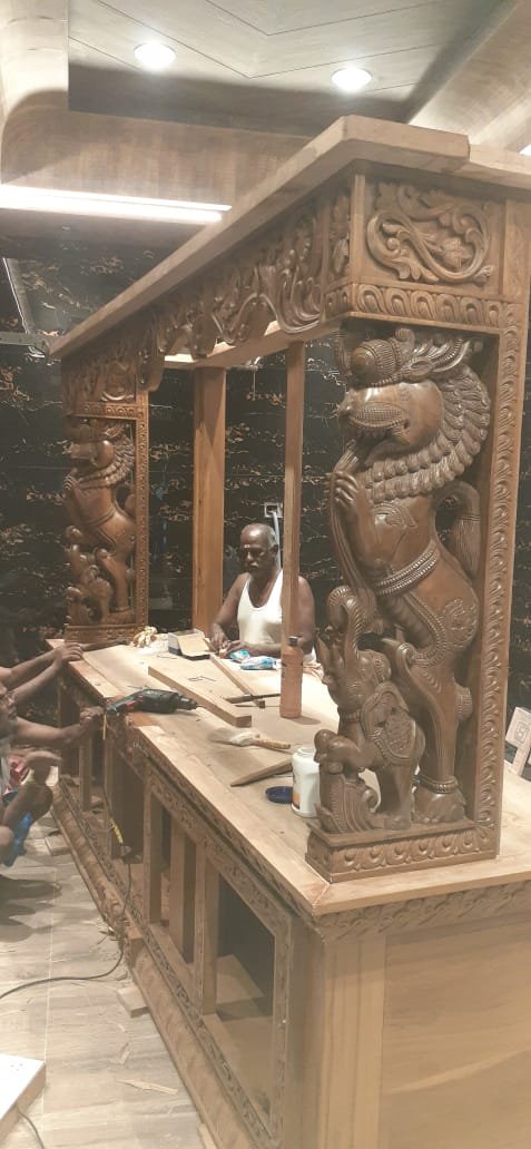 Carved lion pillar, finished architectural woodwork