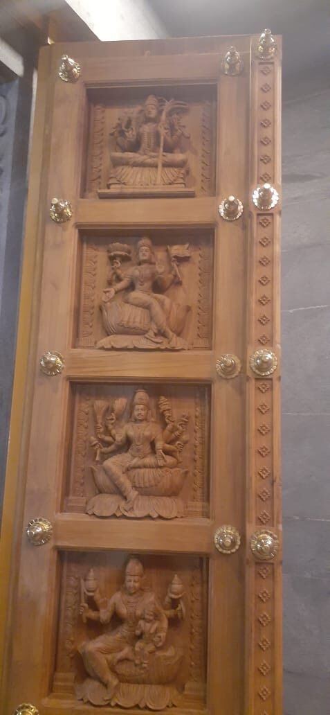 Carved wooden relief panel
